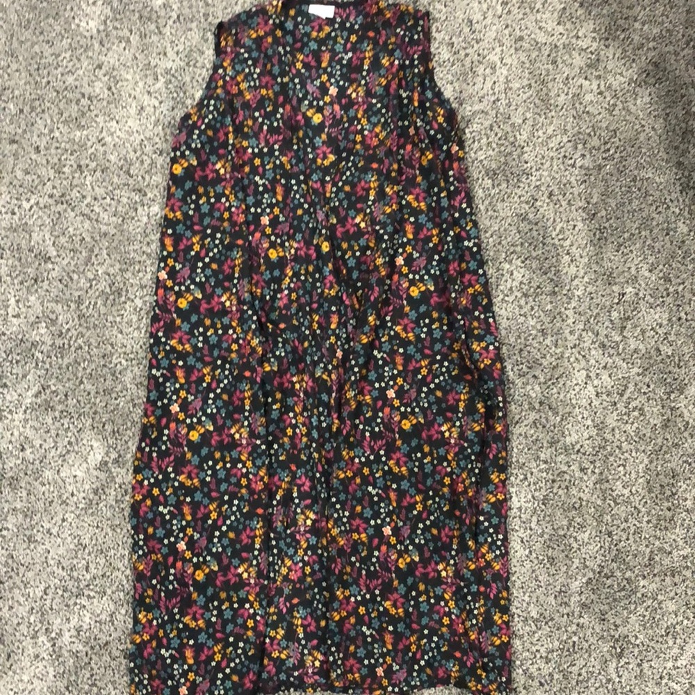 LuLaRoe Sleeveless floral cardigan.